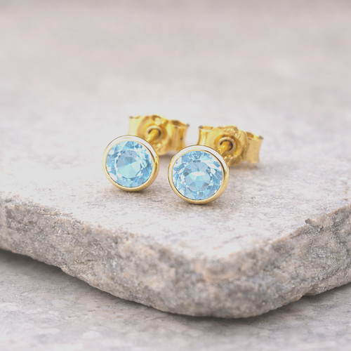 333 gold ohrstecker blautopas - 333,